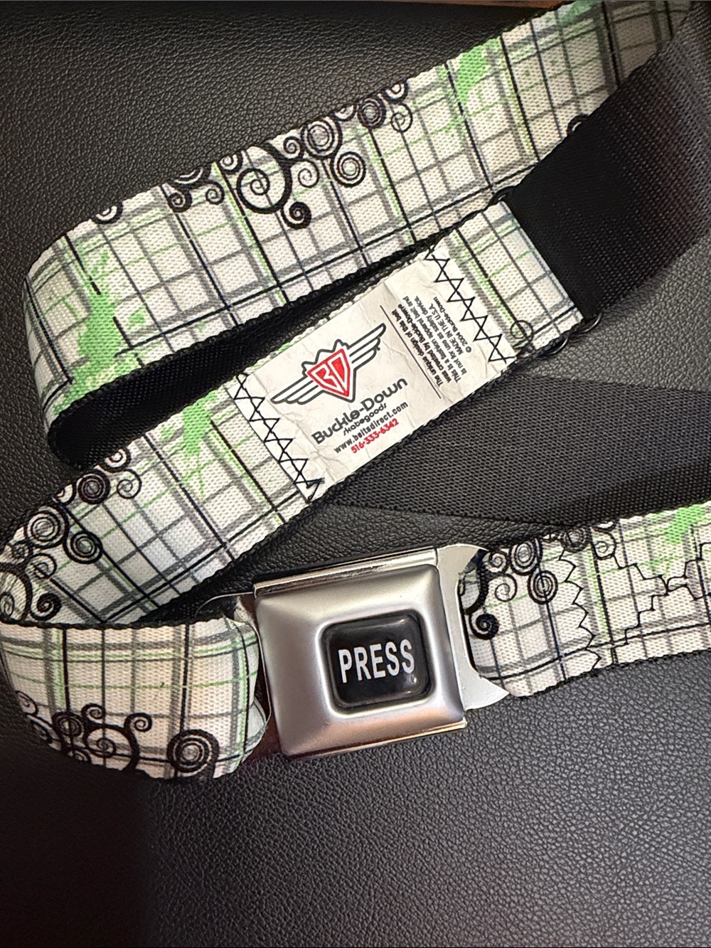 Buckle-Down White & Green Plaid Seatbelt belt with Black Swirl Accents
